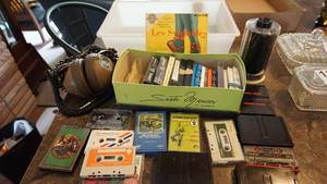 Variety Of Cassettes & Headphones To Plug Into A Stereo