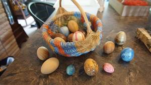 Weaved Basket With Wood & Porcelain & Marble Eggs In It