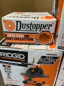 lot 7 image: Ridgid 4 Gallon, 6 Gallon WetDry Shop Vac with Accessories & Dustopper Attachment. See Pictures
