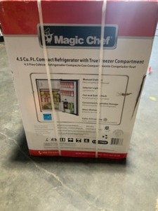 lot 11 image: Magic Chef 4.5 cu. ft. Mini Fridge with True Freezer in Stainless Look. See Pictures