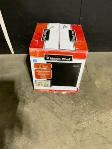 lot 28 image: Magic Chef 1.7 cu. ft. Freezerless Mini Fridge in Black. See Pictures