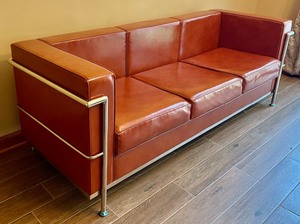 lot 1 image: Beautiful Belnick Leather Sofa with Silver Accents