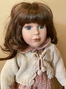 lot 251 image: Yesterdays Child Doll and a Wooden Stool