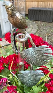 lot 317 image: Resin Planter with Bird Themed Rain Gauge