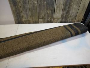 lot 57 image: Studio by Brown Jordan 710 x 10 area rug IndoorOutdoor