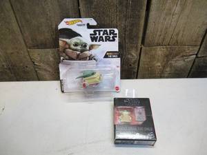 lot 44 image: Star Wars - Hot Wheels Character Car & Star Wars - The Black Series The Child Toy Action Figure