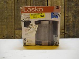 lot 29 image: Lasko Simple Touch 1,500-Watt Electric Ceramic Space Heater with Simple Heat Button