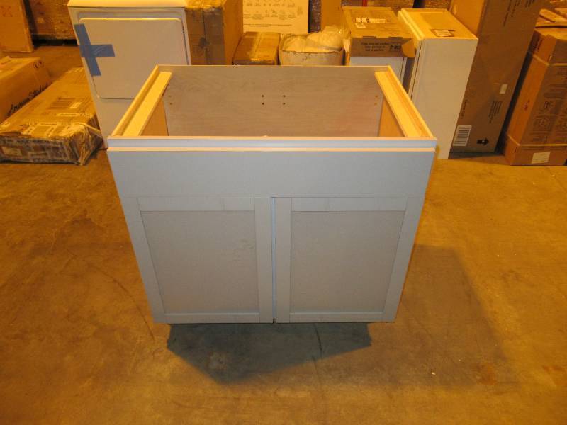 lot 23 image: Hampton Bay Courtland Shaker Assembled 36 in. x 34.5 in. x 24 in. Stock Sink Base Kitchen Cabinet in Sterling Gray Finish
