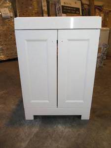 lot 20 image: Shaila 24.5 in. W Bath Vanity in White with Cultured Marble Vanity Top in White with White Basin