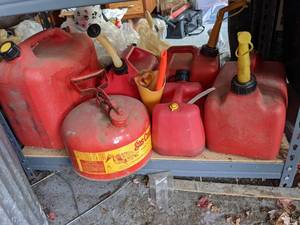 lot 302 image: Lot of (6) Gas Cans and Funnels