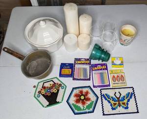 lot 293 image: Mixed Lot of Items Vintage Hemingray 42 Blue Green Glass Electrical Insulator, Candles, Small Pot, Candles, Pot Pad Coaster, & More