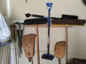 lot 330 image: A Lot of Brooms