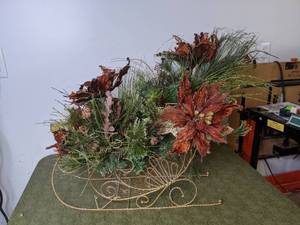 lot 197 image: Christmas Sleigh Flower Arrangement