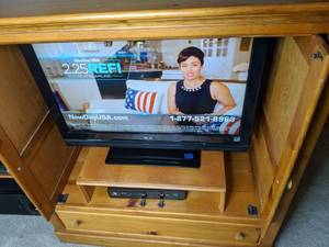 lot 121 image: Entertainment Center with Flipper Doors and Storage Drawer