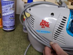 lot 122 image: Dirt Devil Spot Scrubber and 12 Bottles of Cleaning Solution