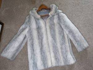 lot 12 image: Beautiful Authentic Bicha Furs Hooded Jacket