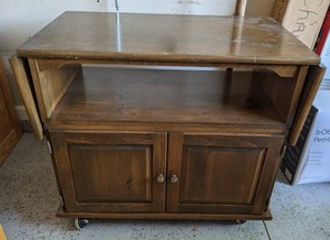 lot 72 image: Vintage Solid Wood TV Stand wFoldable Sides