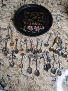 lot 39 image: Collectible North Dakota Plate and Assortment of Vintage Travel Spoons