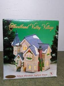 lot 180 image: Heartland Valley Village Blue and White House