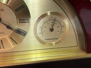 lot 21 image: Bulova Battery Operated Clock With Thermometer and Hygrometer