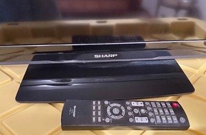 lot 142 image: 32 Inch Sharp TV with Remote