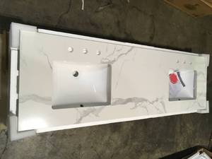 lot 24 image: Home Decorators Collection 73 in. W x 22 in. D x 0.75 in. H Engineered Marble Vanity Top in Calacatta White with White Basins (review pictures)