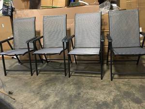 lot 26 image: Black Metal Frame Outdoor Folding Lawn Beach Chair (Set of 4)