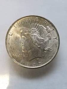 lot 07 image: 1922 PEACE SILVER DOLLAR UNC looks sharper in hand than pics