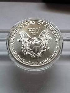 lot 33 image: 1991 AMERICAN SILVER EAGLE 1 TROY OZ. .999 FINE SILVER IN AIRITITE