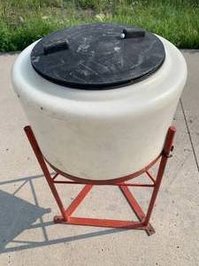 lot 12 image: Norwesco 15 Gallon Cone Bottom Tank With Stand