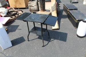 lot 37 image: Metal Table on wheels