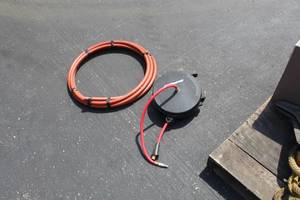 lot 64 image: Coleman Powermate Air Hose Reel  with Air Hose