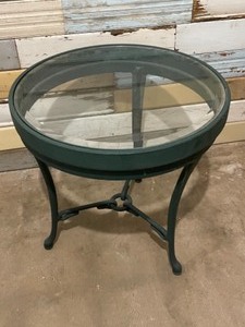 Round cast patio table with glass top