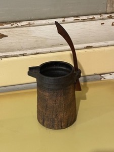 Vintage pitcher with wood handle