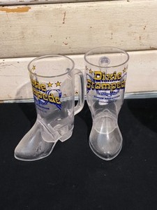 Variety of souvenir mugs, tin, glass, plastic, ceramic