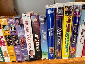 lot 302 image: Lot of VHS Tapes and DVDs
