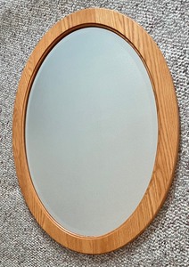 lot 120 image: Oval Wall Mirror with a Wooden Frame