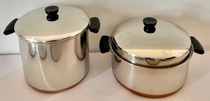 lot 129 image: 10 Revere Ware Pots and Pans with Lids