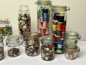 lot 245 image: Variety of Decorative Jars Filled with Sewing Notions