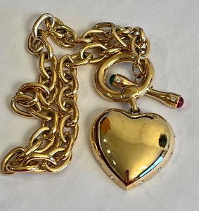 lot 231 image: Vintage Givenchy Heart Toggle Gold Tone Necklace