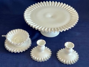 lot 44 image: Vintage Silver Crest Milk Glass Pedestal Cake Server & Pair of Candle Holders