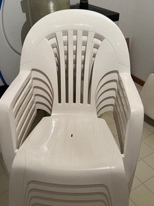 lot 325 image: Six Plastic Patio Chairs and Four Plastic Side Tables