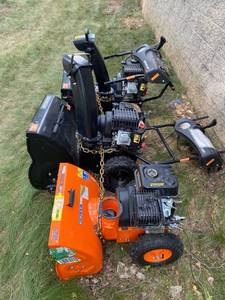 Lot of Snow blowers for parts o repairs