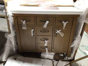 Bellington 42 in. W x 22 in. D Vanity in Almond Toffee with Cultured Marble Vanity Top in White with White Sink in good condition see pictures