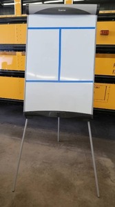 HEIGHT ADJUSTABLE EASEL WITH WHITE ERASE BOARD.