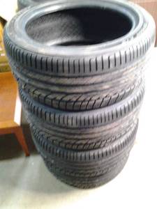 lot 101 image: Brand new set of 4 Dunlop Conquest ...