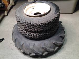 lot 111 image: Set of 3 miscellaneous tires and ri...