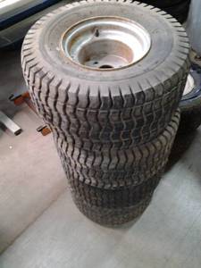 lot 140 image: Set of 4 near new, preowned turf ki...