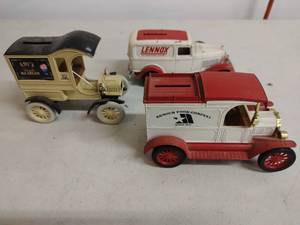 lot 16 image: Three Collectible Ford Piggy Bank Cars by Ertl