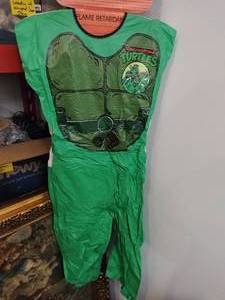 lot 31 image: Teenage Mutant Ninja Turtles Vinyl Costume